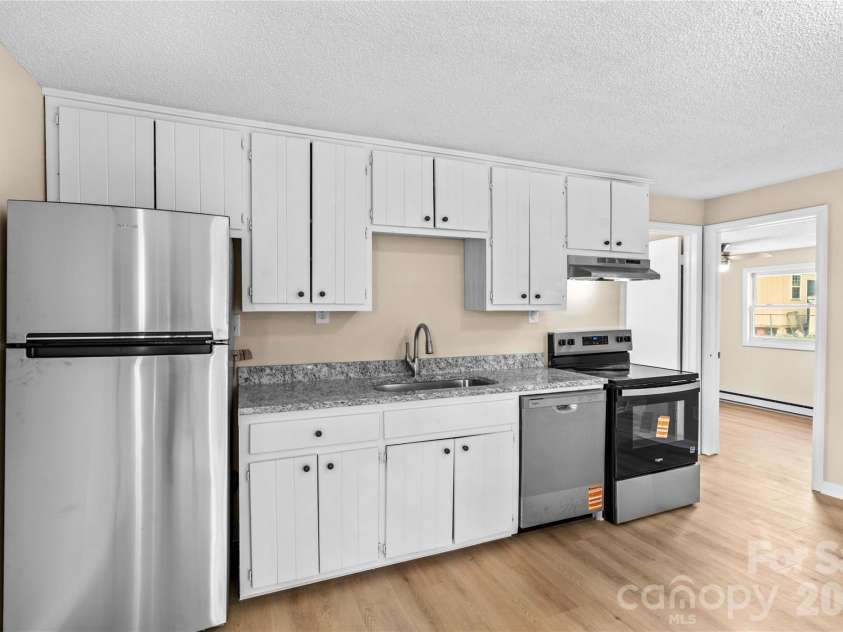 126 Thomas Street, Troutman, NC 28166.  MLS# CAR4355493, YatesRealty ID 7478. Brand New SS Refrigerator, D/W, Range