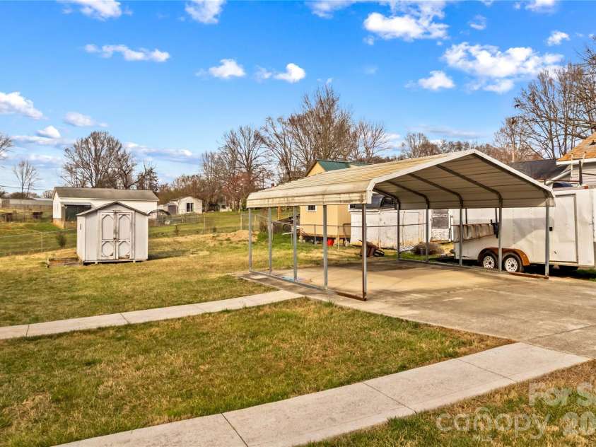 126 Thomas Street, Troutman, NC 28166.  MLS# CAR4355493, YatesRealty ID 7478. Covered Parking