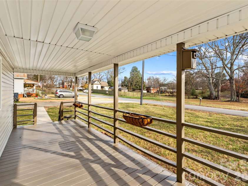 126 Thomas Street, Troutman, NC 28166.  MLS# CAR4355493, YatesRealty ID 7478. Front Porch