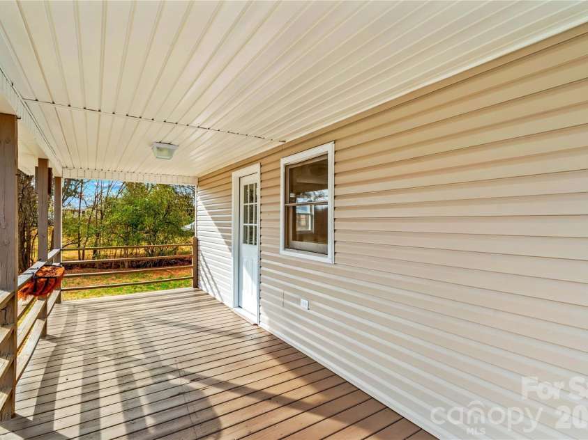 126 Thomas Street, Troutman, NC 28166.  MLS# CAR4355493, YatesRealty ID 7478. Full Covered Front Porch