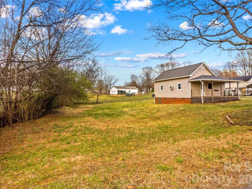 126 Thomas Street, Troutman, NC 28166.  MLS# CAR4355493, YatesRealty ID 7478. Spacious Yard