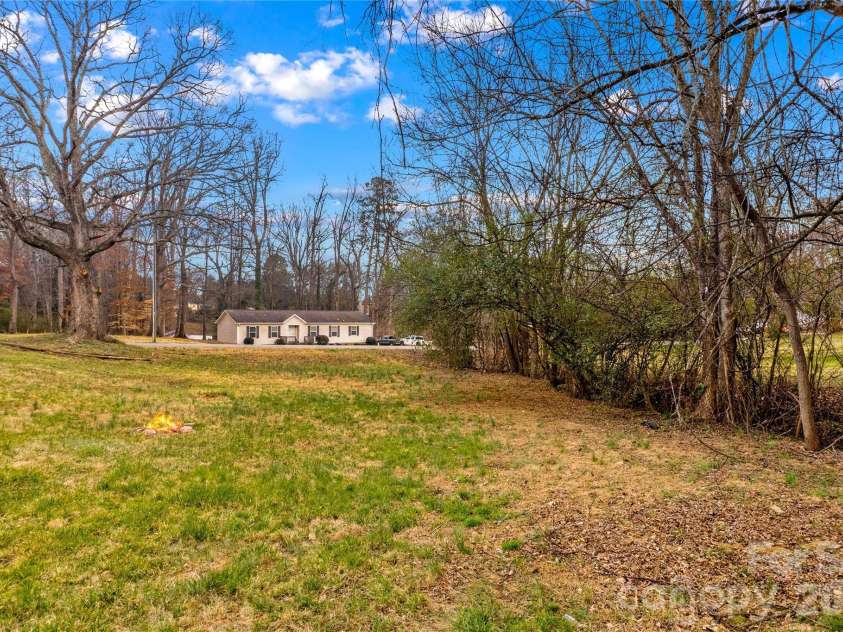 126 Thomas Street, Troutman, NC 28166.  MLS# CAR4355493, YatesRealty ID 7478. Yard