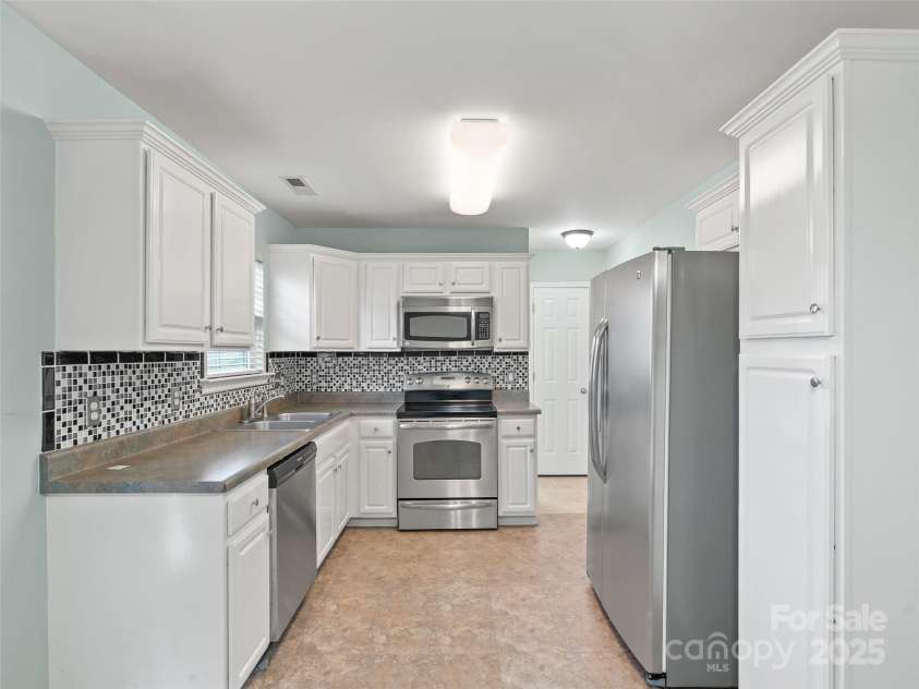 24 Torrington Avenue, Fletcher, NC 28732.  MLS# CAR4320857, YatesRealty ID 748. 