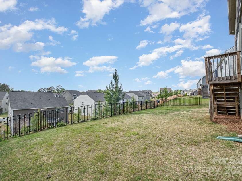17502 Snug Harbor Road, Charlotte, NC 28278.  MLS# CAR4247407, YatesRealty ID 7488. Elevated back yard 