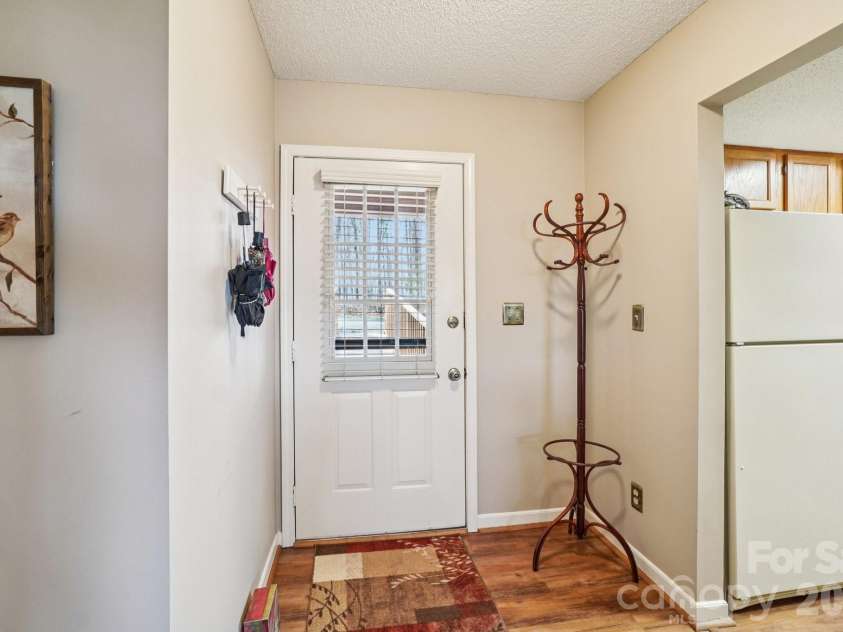 409 Whitney Boulevard, Lake Lure, NC 28746.  MLS# CAR4363769, YatesRealty ID 7498. 