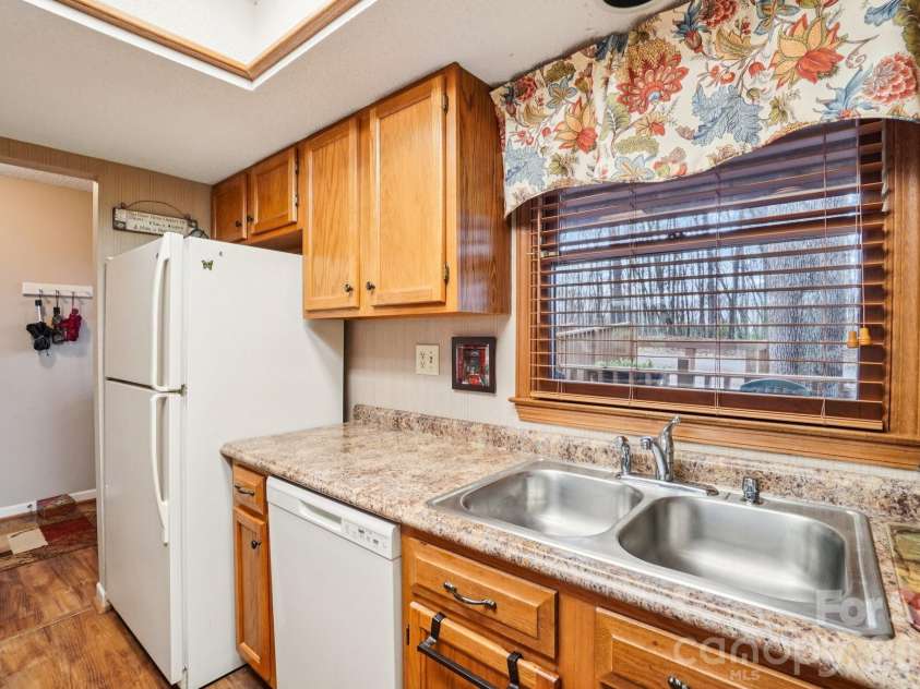 409 Whitney Boulevard, Lake Lure, NC 28746.  MLS# CAR4363769, YatesRealty ID 7498. 