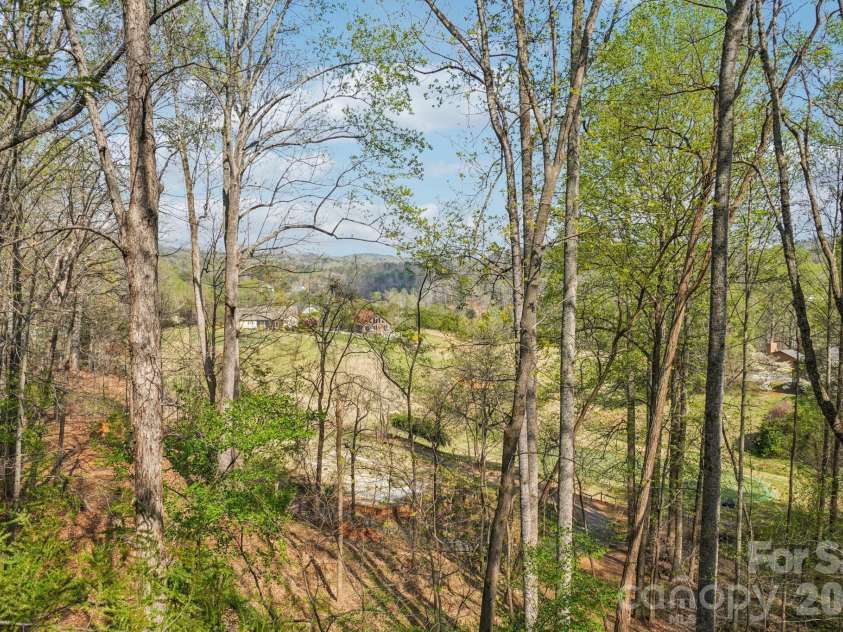 409 Whitney Boulevard, Lake Lure, NC 28746.  MLS# CAR4363769, YatesRealty ID 7498. 