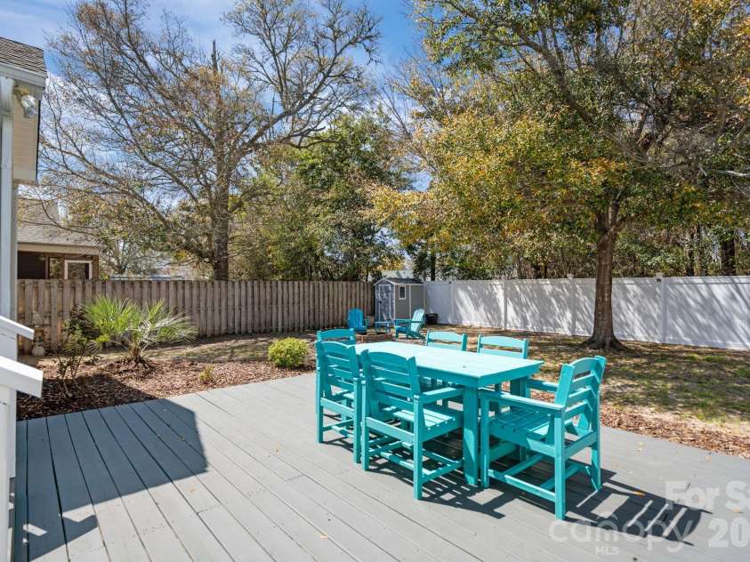 137 4th Street, Oak Island, NC 28465.  MLS# CAR4363767, YatesRealty ID 7502. Lower deck