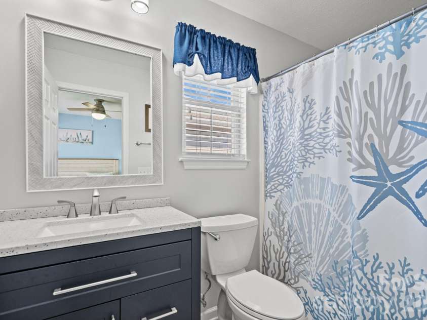 137 4th Street, Oak Island, NC 28465.  MLS# CAR4363767, YatesRealty ID 7502. Primary en-suite