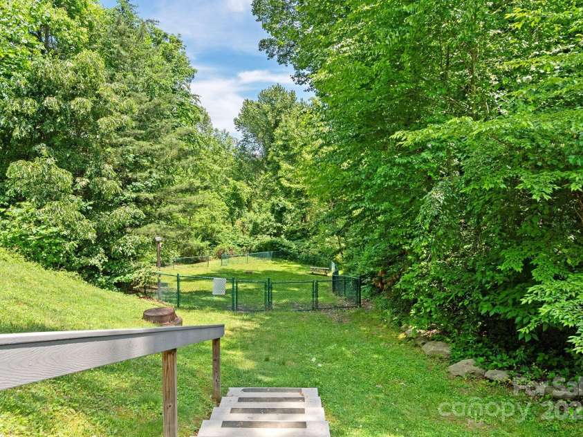 400 Vista Lake Drive, Candler, NC 28715.  MLS# CAR4222116, YatesRealty ID 7505. Doggie park