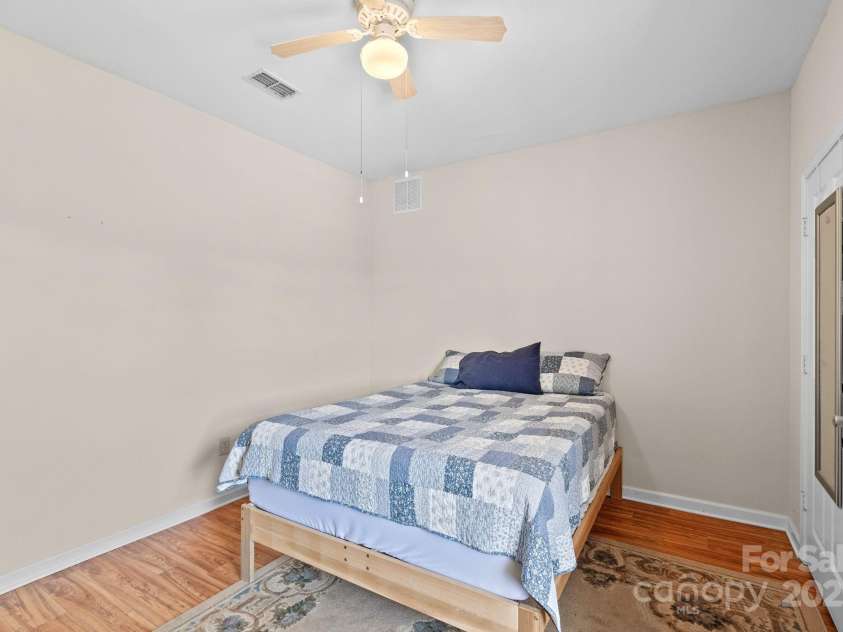 400 Vista Lake Drive, Candler, NC 28715.  MLS# CAR4222116, YatesRealty ID 7505. Primary bedroom