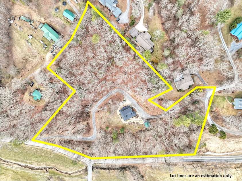 109 Paradise Circle, Clyde, NC 28721.  MLS# CAR4352069, YatesRealty ID 7513. 5.10 Acres of Privacy