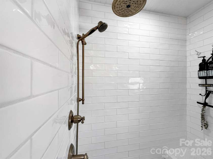 109 Paradise Circle, Clyde, NC 28721.  MLS# CAR4352069, YatesRealty ID 7513. Large Step-in Shower