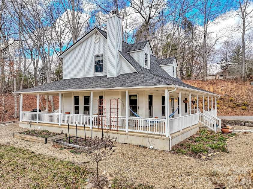 109 Paradise Circle, Clyde, NC 28721.  MLS# CAR4352069, YatesRealty ID 7513. Wrap Around Porch