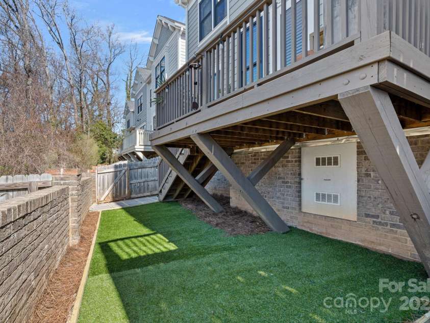 2721 Kilgo Way, Charlotte, NC 28205.  MLS# CAR4229066, YatesRealty ID 7515. Turf yard with crawl space storage