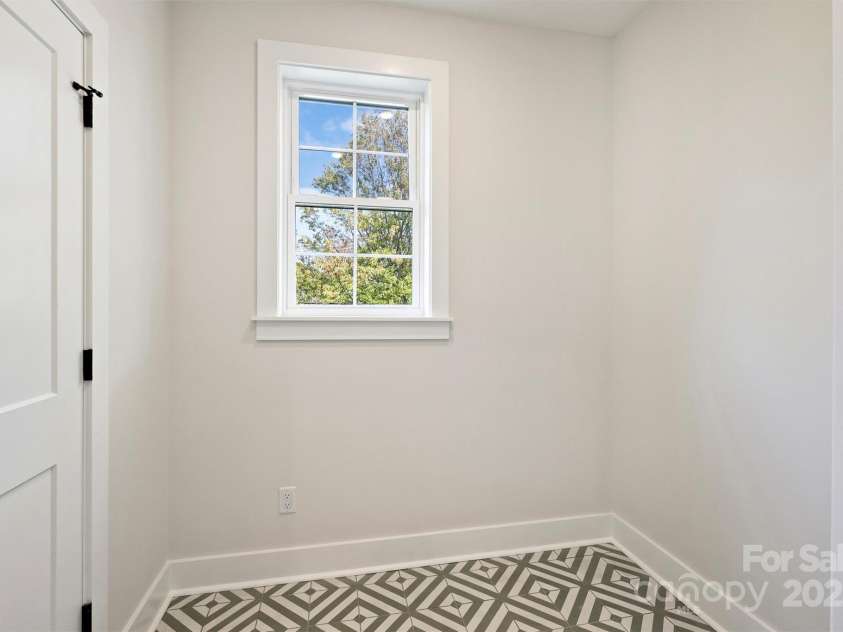 571 Lyttleton Drive, Charlotte, NC 28211.  MLS# CAR4193437, YatesRealty ID 7516. Laundry Room on 2nd Floor