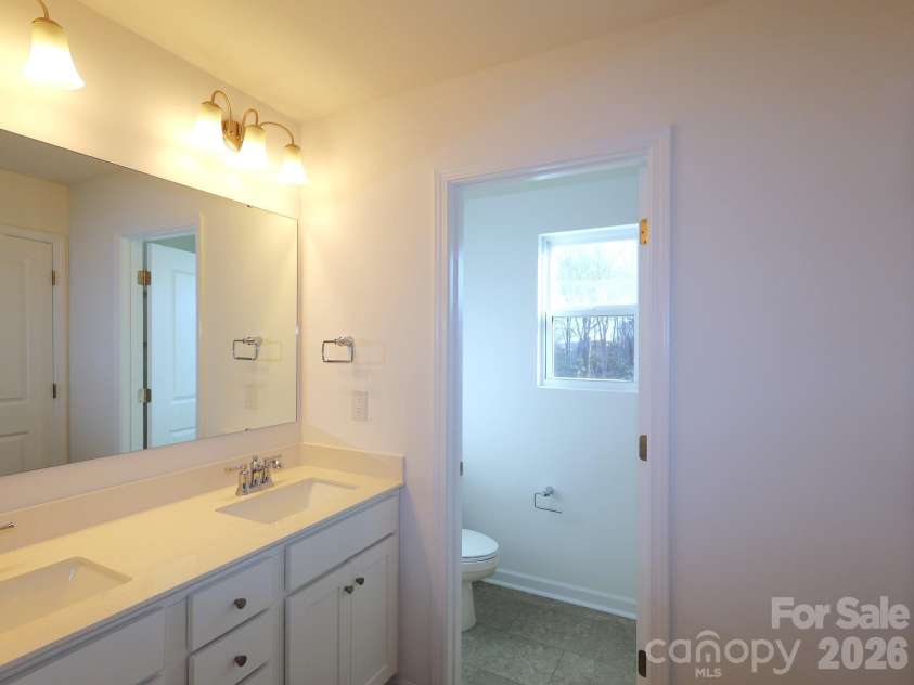 771 Kitfox Drive, Concord, NC 28027.  MLS# CAR4337178, YatesRealty ID 7518. Owner's suite