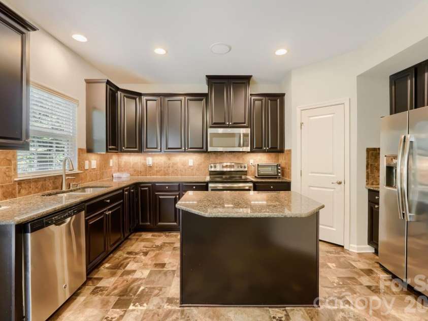 1295 Farm Branch Drive, Concord, NC 28027.  MLS# CAR4349217, YatesRealty ID 7526. Kitchen