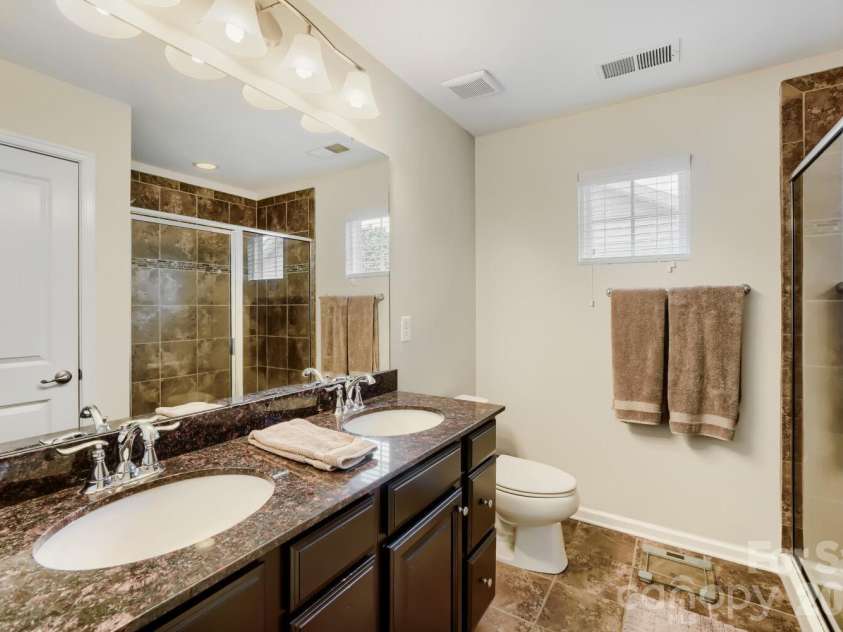 1295 Farm Branch Drive, Concord, NC 28027.  MLS# CAR4349217, YatesRealty ID 7526. Primary bathroom