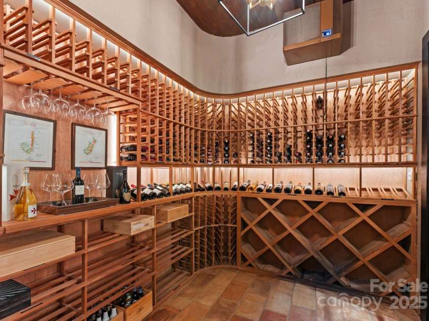 4536 Fox Brook Lane, Charlotte, NC 28211.  MLS# CAR4157549, YatesRealty ID 7532. 700+ bottle, climate controlled, walk-in wine cellar.