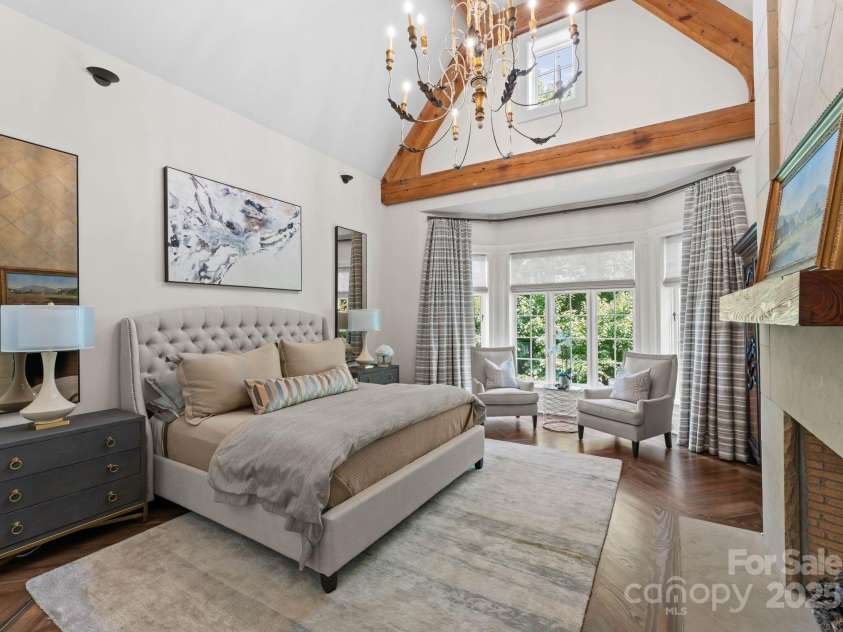 4536 Fox Brook Lane, Charlotte, NC 28211.  MLS# CAR4157549, YatesRealty ID 7532. Bed and breakfast style Guest retreat with vaulted ceiling, exposed beams, and fireplace.