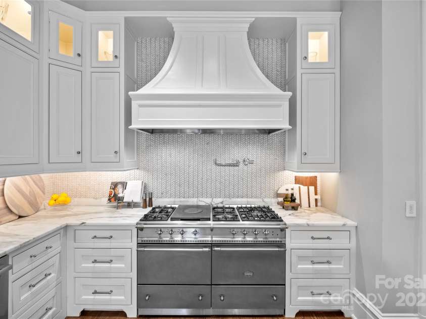4536 Fox Brook Lane, Charlotte, NC 28211.  MLS# CAR4157549, YatesRealty ID 7532. Classique French Lacanche 6 burner range with dual oven on custom hood.