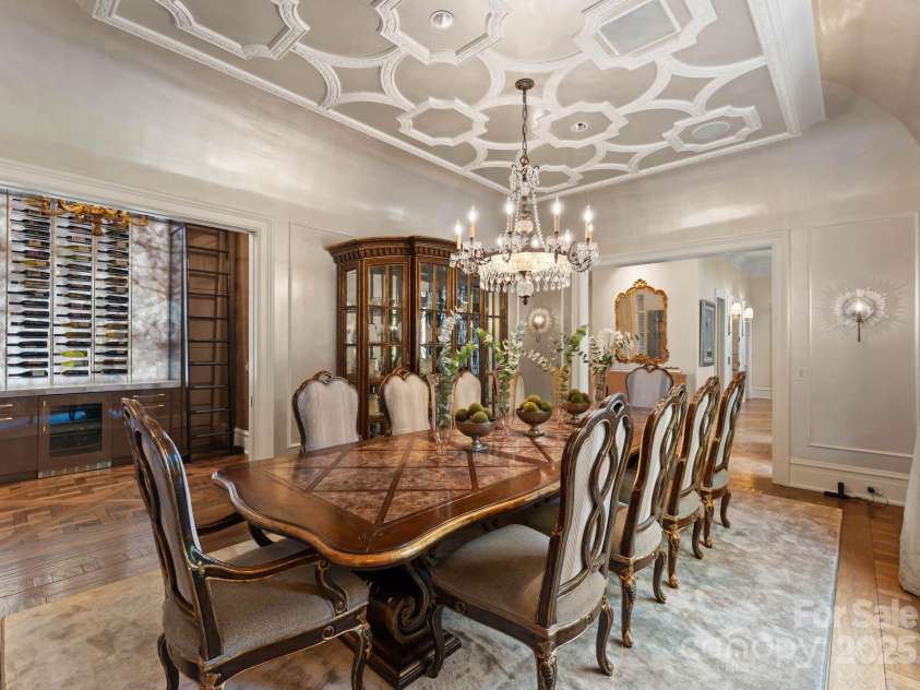 4536 Fox Brook Lane, Charlotte, NC 28211.  MLS# CAR4157549, YatesRealty ID 7532. Dining room with custom butlers pantry. Signature hand crafted trim work throughout.