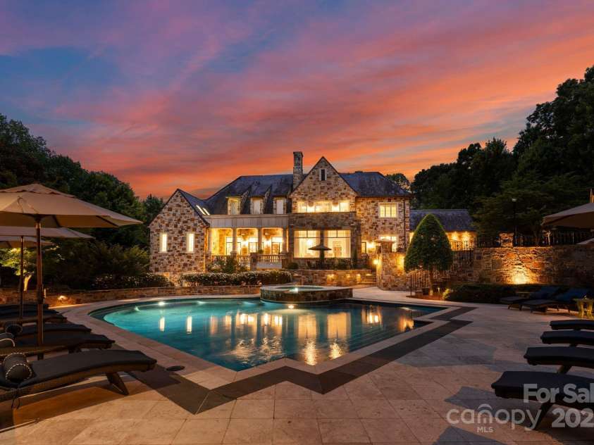 4536 Fox Brook Lane, Charlotte, NC 28211.  MLS# CAR4157549, YatesRealty ID 7532. Foxbrook Oasis with saltwater pool and spa, cabana with full kitchen, fireplace, water feature, and dining area.