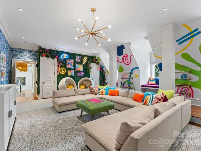 4536 Fox Brook Lane, Charlotte, NC 28211.  MLS# CAR4157549, YatesRealty ID 7532. Large game room/play room with full bathroom and secret art studio space