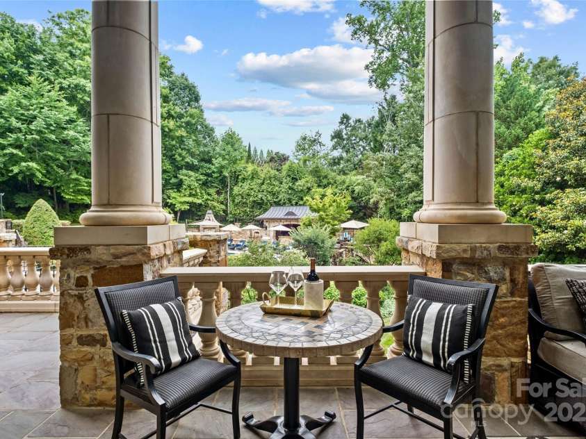4536 Fox Brook Lane, Charlotte, NC 28211.  MLS# CAR4157549, YatesRealty ID 7532. Large outdoor covered terrace overlooking the backyard oasis.