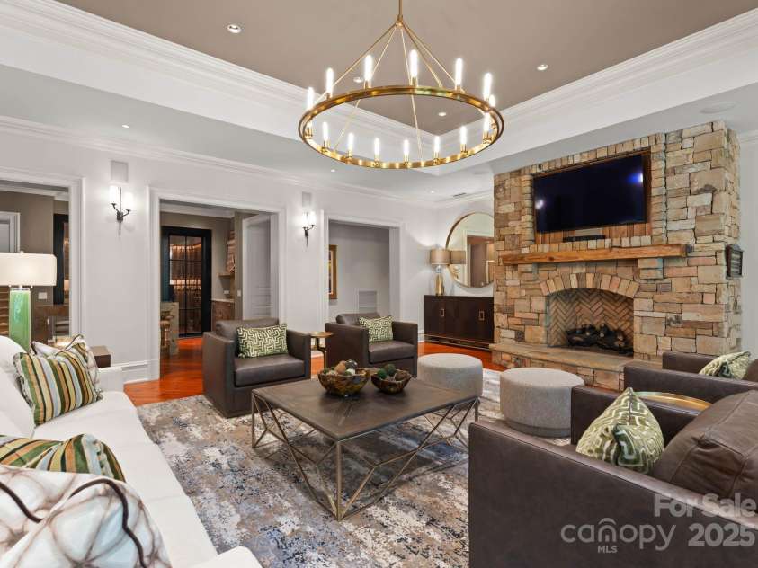 4536 Fox Brook Lane, Charlotte, NC 28211.  MLS# CAR4157549, YatesRealty ID 7532. Living area includes fireplace- stone with wood mantle and custom Furniture