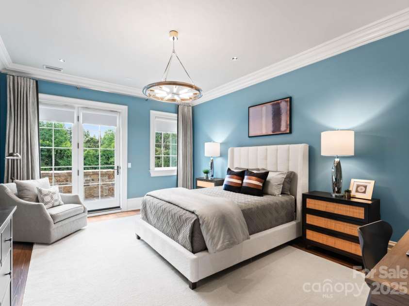 4536 Fox Brook Lane, Charlotte, NC 28211.  MLS# CAR4157549, YatesRealty ID 7532. Secondary bedroom offers a large terrace overlooking the backyard oasis.