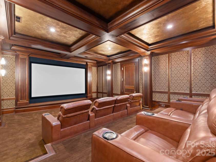 4536 Fox Brook Lane, Charlotte, NC 28211.  MLS# CAR4157549, YatesRealty ID 7532. Theater room with projector and screen system.