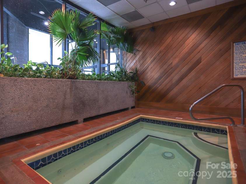 303 Sugar Top Drive, Sugar Mountain, NC 28604.  MLS# CAR4302428, YatesRealty ID 7533. Hot Tub