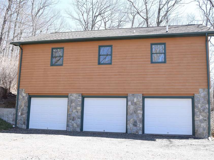 621 Firetower Road, Spruce Pine, NC 28777.  MLS# CAR4239673, YatesRealty ID 7544. Workshop and apartment on top
