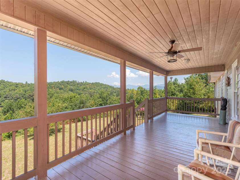 1120 Jacobs Branch Road, Franklin, NC 28734.  MLS# CAR4176894, YatesRealty ID 7545. Covered deck looks out near and far