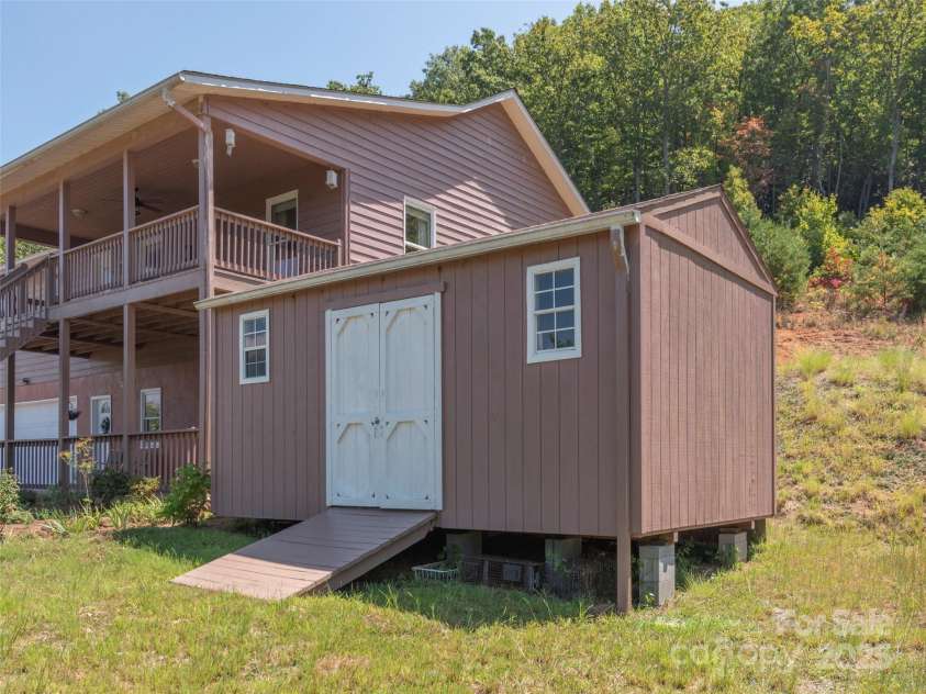 1120 Jacobs Branch Road, Franklin, NC 28734.  MLS# CAR4176894, YatesRealty ID 7545. Great gardening/storage shed