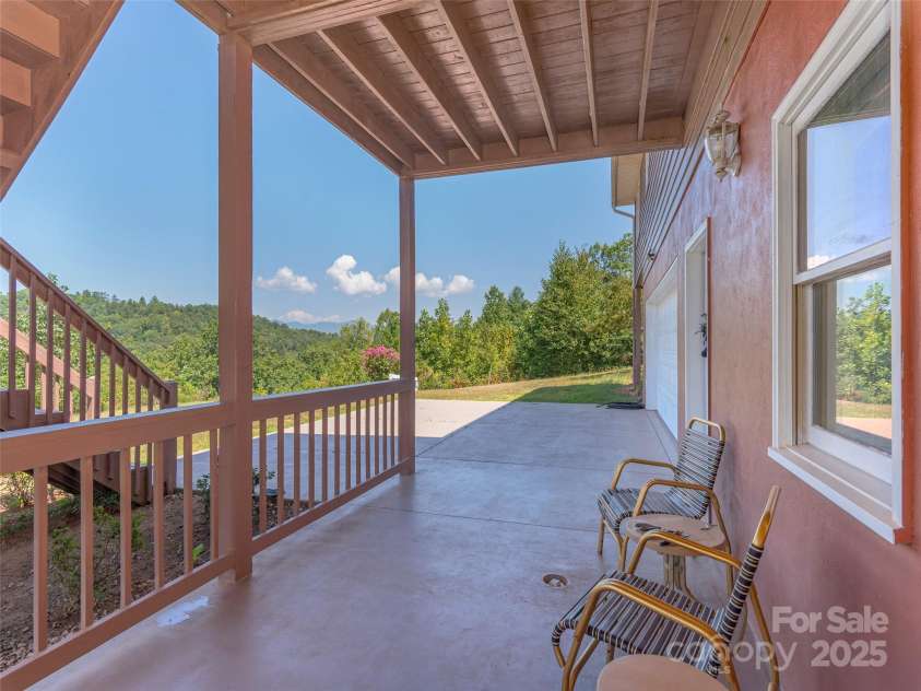1120 Jacobs Branch Road, Franklin, NC 28734.  MLS# CAR4176894, YatesRealty ID 7545. Lower covered patio