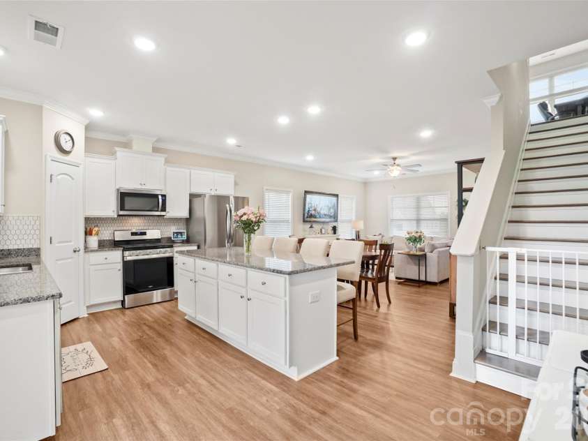 11249 Island VIew Lane, Lancaster, SC 29720.  MLS# CAR4333365, YatesRealty ID 7553. Kitchen and stairs to 2nd level