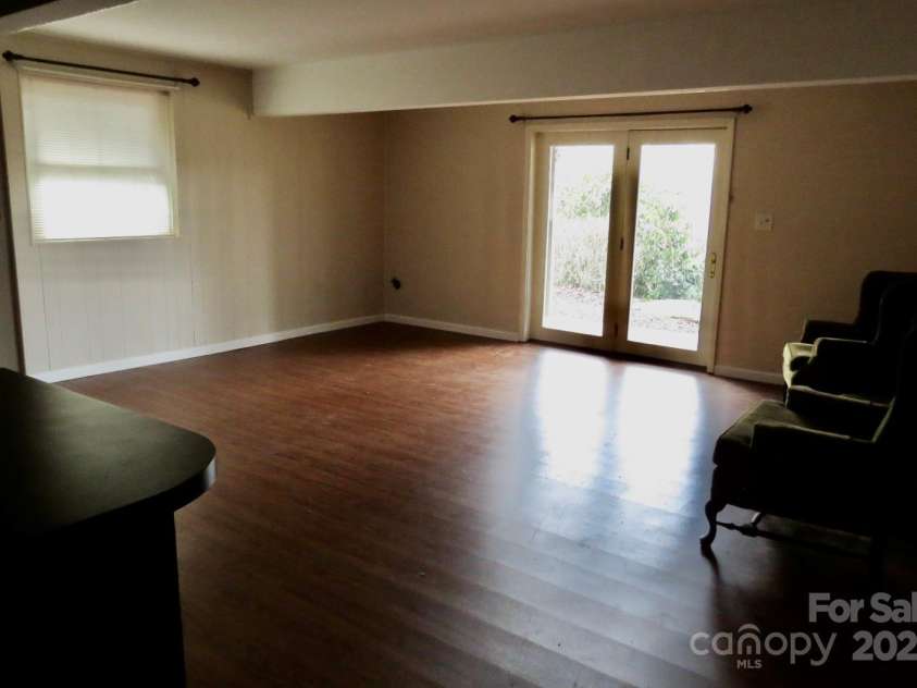 871 Glen Cannon Drive, Pisgah Forest, NC 28768.  MLS# CAR4216993, YatesRealty ID 7558. Basement level bonus room. Great for office, exercise, crafts