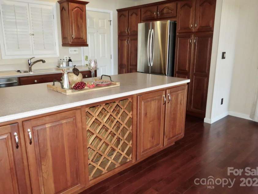 871 Glen Cannon Drive, Pisgah Forest, NC 28768.  MLS# CAR4216993, YatesRealty ID 7558. Island has storage on both sides