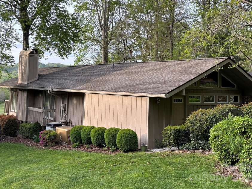 871 Glen Cannon Drive, Pisgah Forest, NC 28768.  MLS# CAR4216993, YatesRealty ID 7558. Left side of house