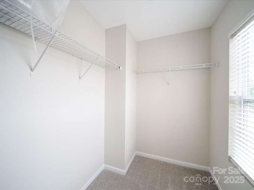 1120 Spicewood Pines Road, Fort Mill, SC 29708.  MLS# CAR4215795, YatesRealty ID 7563. Bedroom 3 Walk-In Closet