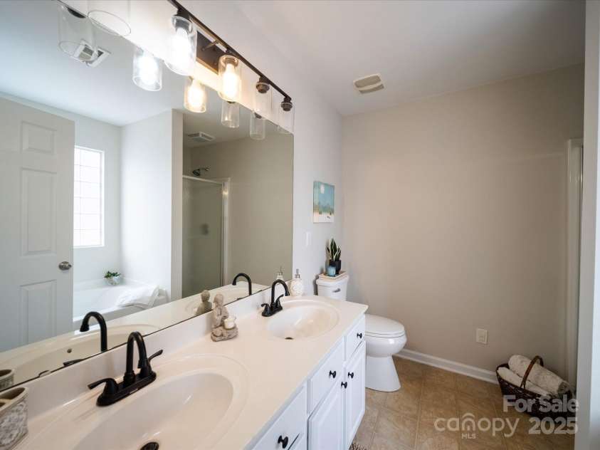 1120 Spicewood Pines Road, Fort Mill, SC 29708.  MLS# CAR4215795, YatesRealty ID 7563. Owner's Bath