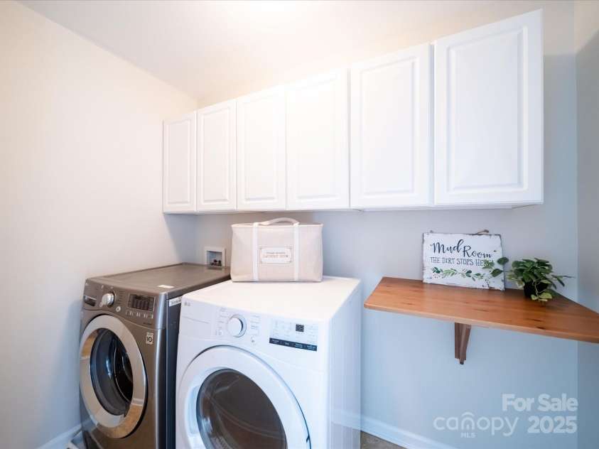 1120 Spicewood Pines Road, Fort Mill, SC 29708.  MLS# CAR4215795, YatesRealty ID 7563. Upstairs Laundry Room with Upper Cabinets