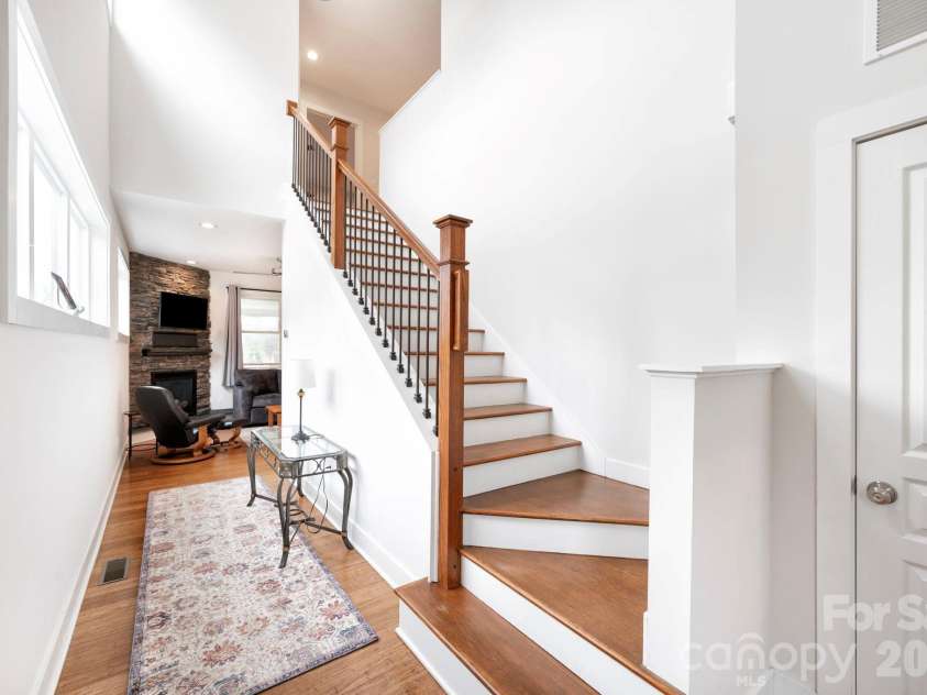31 Central Avenue, Asheville, NC 28806.  MLS# CAR4355209, YatesRealty ID 7563. Staircase to upper level