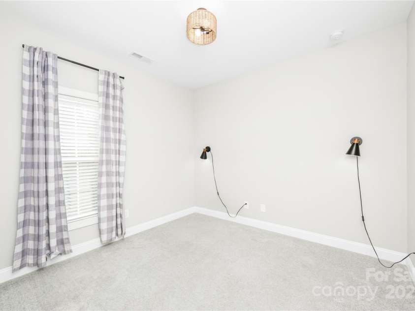 169 Turnberry Drive, Mocksville, NC 27028.  MLS# CAR4239304, YatesRealty ID 7567. Bedroom Three