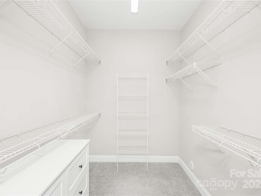 169 Turnberry Drive, Mocksville, NC 27028.  MLS# CAR4239304, YatesRealty ID 7567. Primary Closet