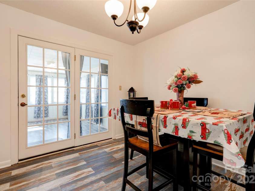1033 College Avenue, Shelby, NC 28152.  MLS# CAR4314488, YatesRealty ID 7574. Dining Room has French doors leading to the Sun Room.