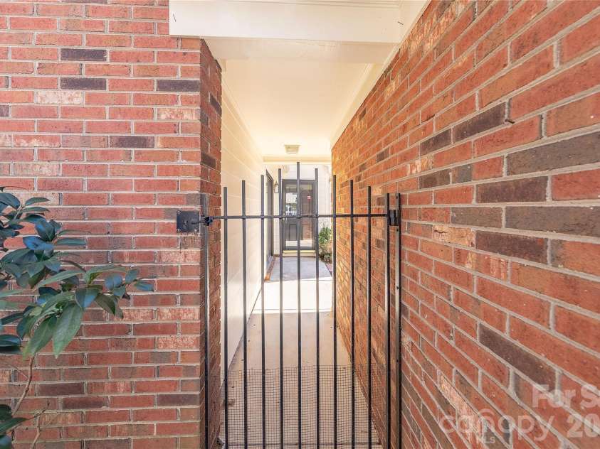 2401 Quail Lake Drive, Charlotte, NC 28210.  MLS# CAR4360721, YatesRealty ID 7576. Front Courtyard